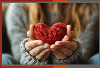 Knitted heart in hands graphic